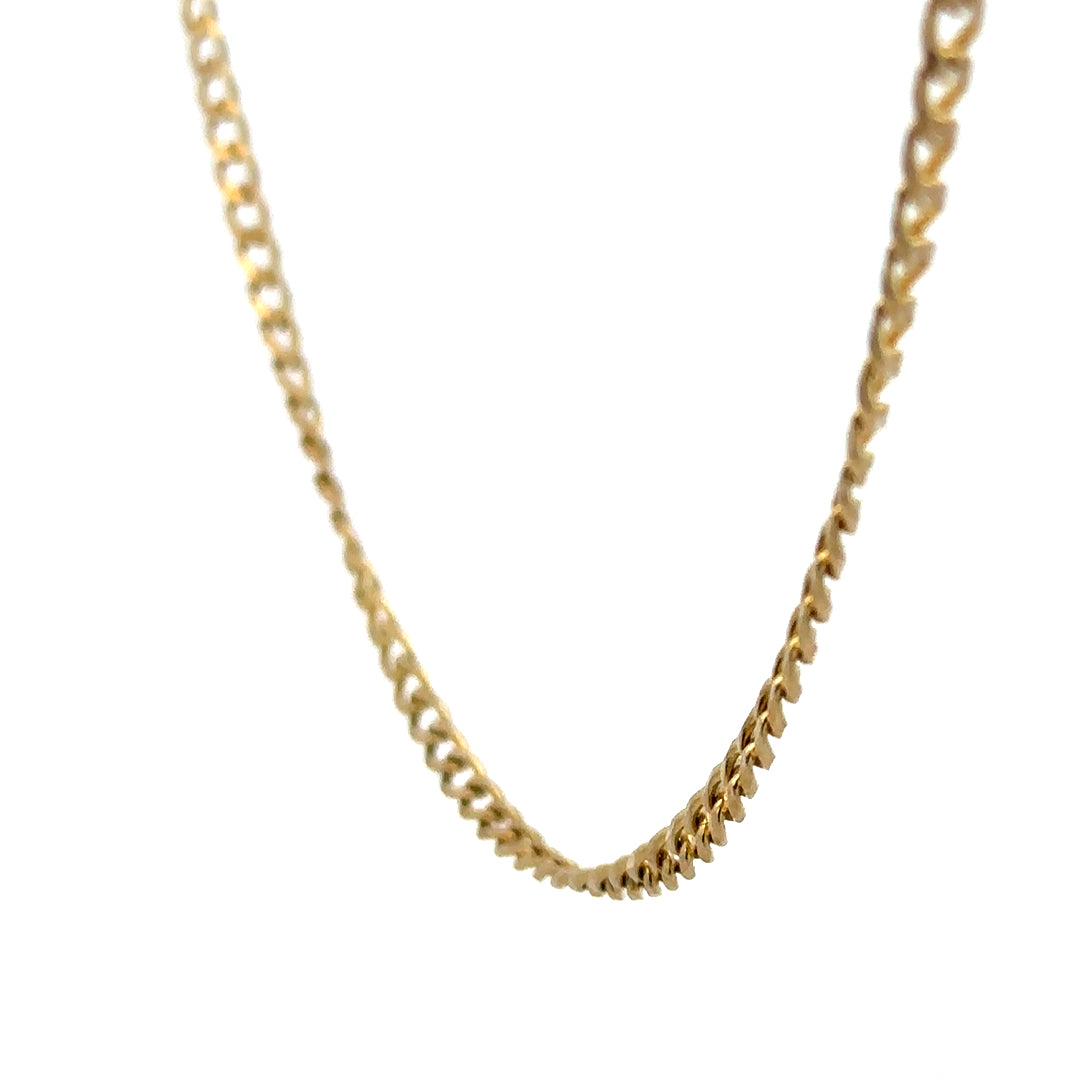 9ct yellow gold chain weighing 7.4g, unbranded jewelry accessory with intricate link design, shown on a white background.