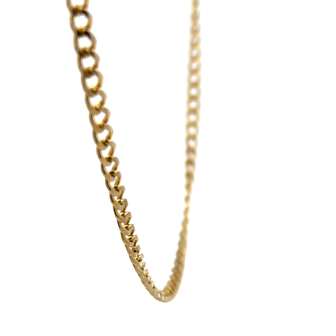 9ct yellow gold chain weighing 7.4g, unbranded, with a detailed close-up of the elegant jewelry link design.
