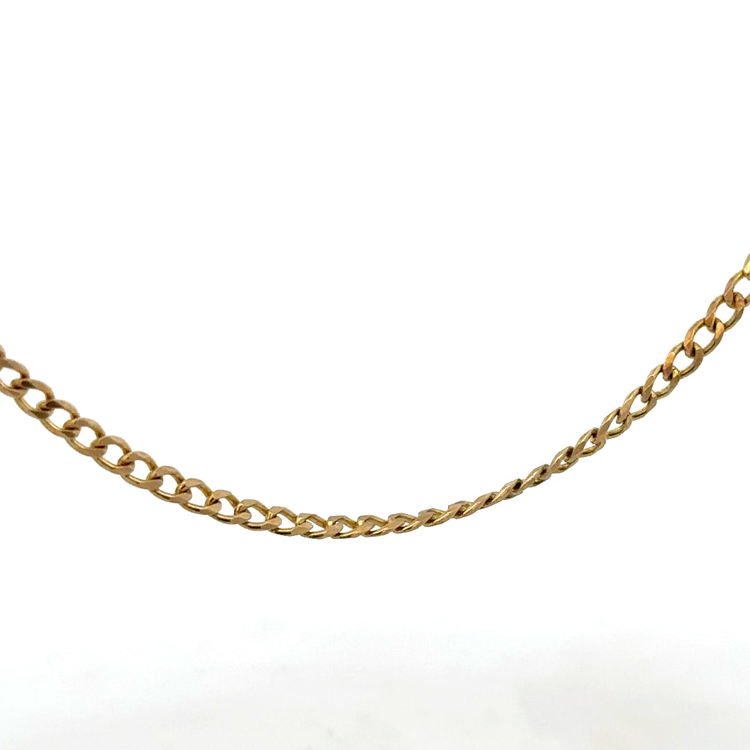 9ct yellow gold chain weighing 7.4g, unbranded jewelry chain with a classic link design, shown in a close-up image.