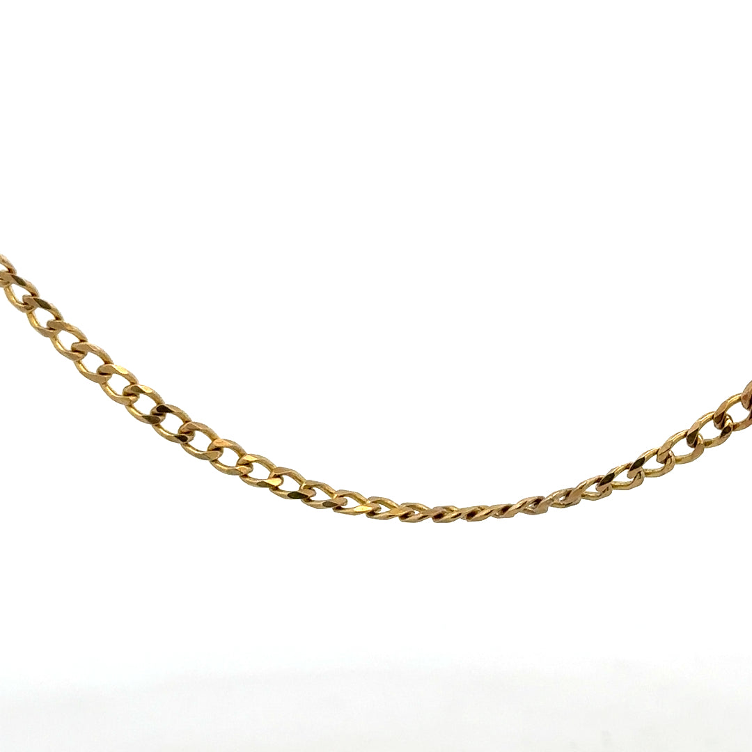 9ct yellow gold chain weighing 7.4g, showcasing a fine unbranded jewelry chain with detailed links.