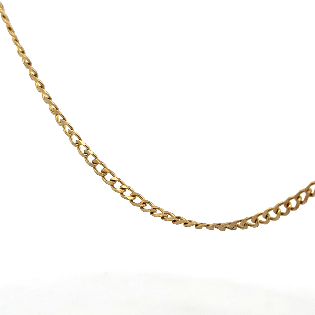 9ct yellow gold chain weighing 7.4g, unbranded jewelry chain with a classic design, visible links and polished finish.