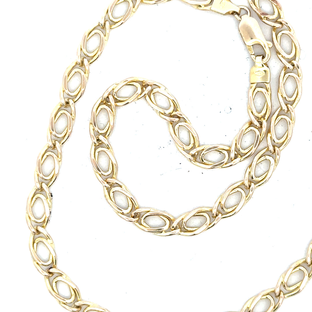 9ct yellow gold chain weighing 7.8g, unbranded, with detailed links, shown on a plain background for jewelry display.