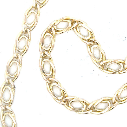 9ct yellow gold chain weighing 7.8g, unbranded jewelry accessory with a classic chain design.