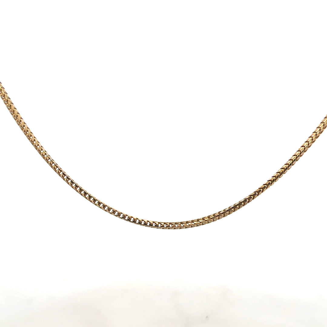 9ct yellow gold chain weighing 9.2g, unbranded, with a classic link design, displayed against a neutral background.