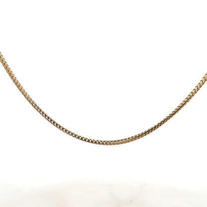 9ct yellow gold chain weighing 9.2g, unbranded, with a classic link design, displayed against a neutral background.