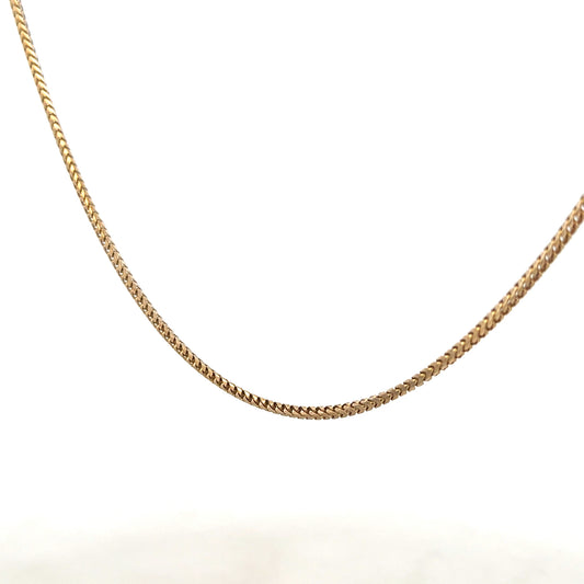 9ct yellow gold chain weighing 9.2g, unbranded, with a detailed link design, shown on a plain background.