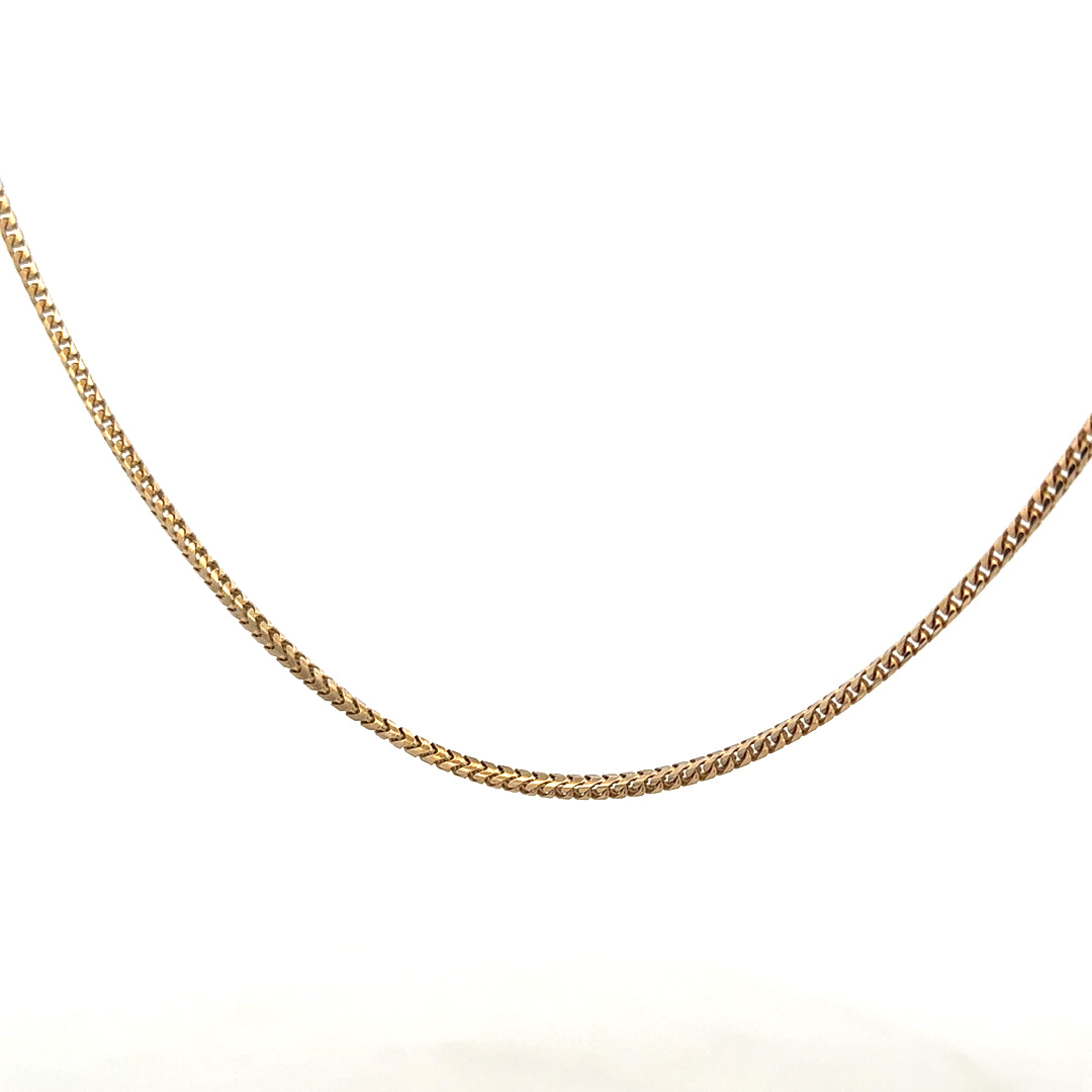 9ct yellow gold chain weighing 9.2g, unbranded, with a classic link design, shown in a close-up image.