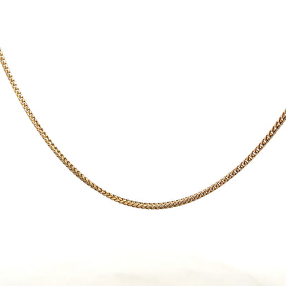 9ct yellow gold chain weighing 9.2g, unbranded, with a classic link design, shown in a close-up image.