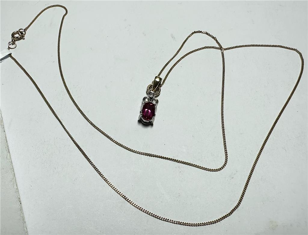 9ct yellow gold chain with diamond pendant, featuring a delicate design and sparkling stones, weighs approximately 1.9 grams.