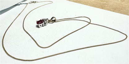 9ct yellow gold chain with diamond pendant, featuring a delicate design and sparkling diamond accent, weighing 1.9g.