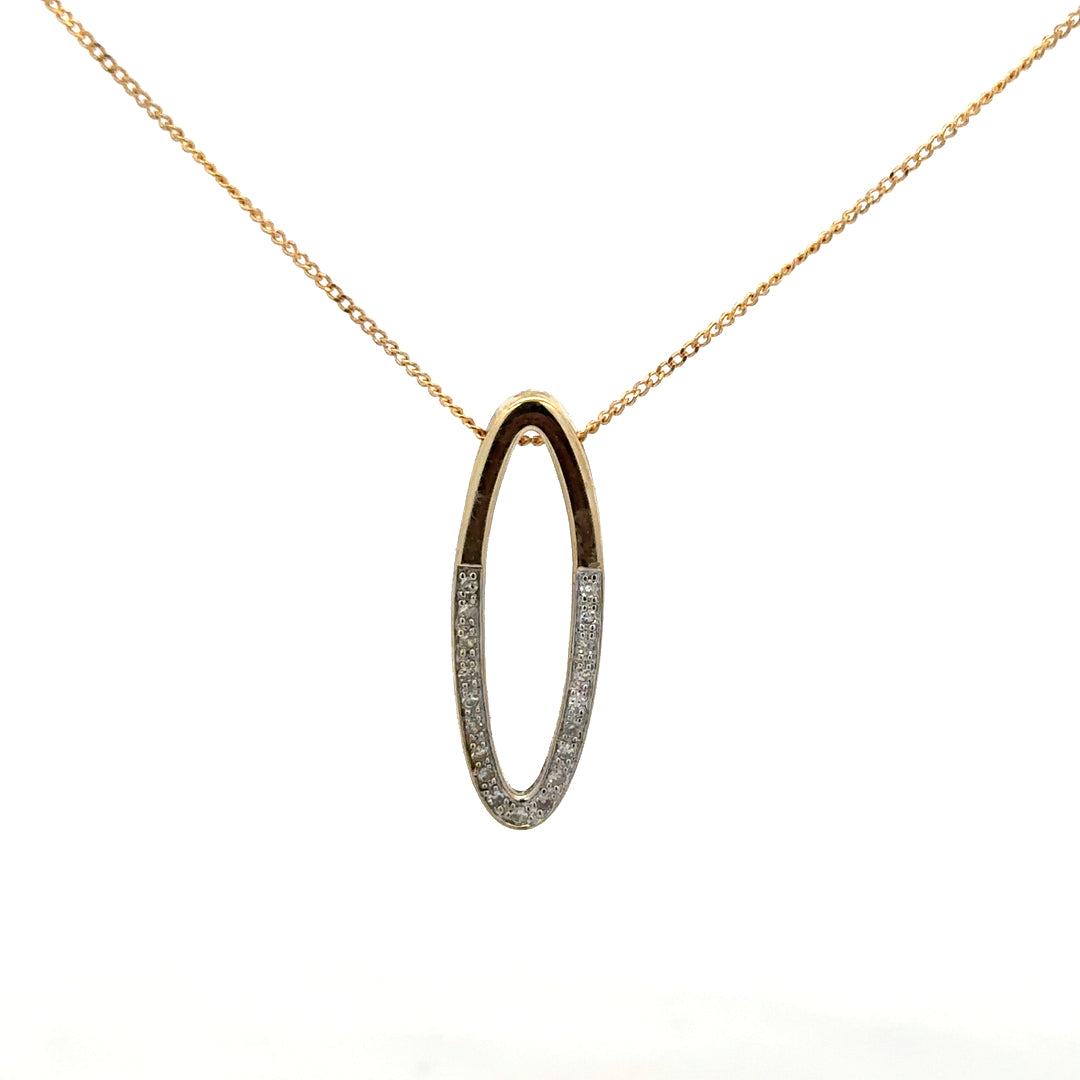 9ct yellow gold chain with a diamond pendant, showcasing a delicate and elegant jewelry piece with detailed craftsmanship.