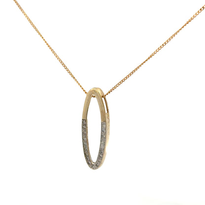 9ct yellow gold chain with diamond pendant, showcasing a delicate chain and sparkling diamond accent on a plain background.