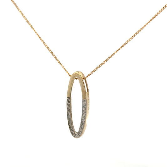 9ct yellow gold chain with diamond pendant, showcasing a delicate chain and sparkling diamond accent on a plain background.