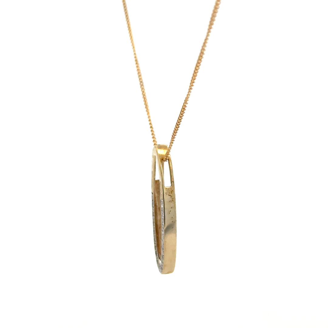 9ct yellow gold chain with diamond pendant, lightweight jewelry piece, showcasing a delicate gold chain with sparkling diamond accents.
