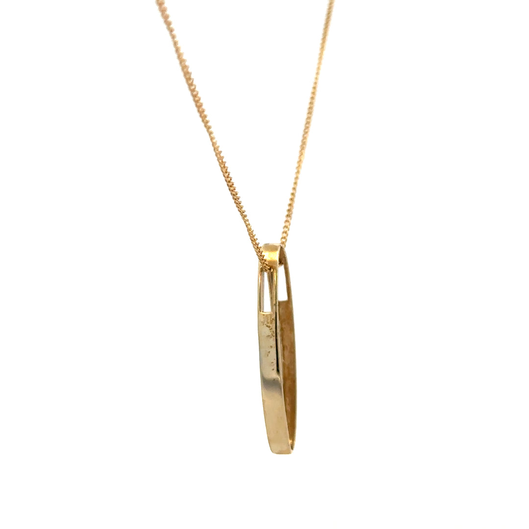 9ct yellow gold chain with diamond pendant, showcasing a delicate design and sparkling diamonds on a sleek gold chain.
