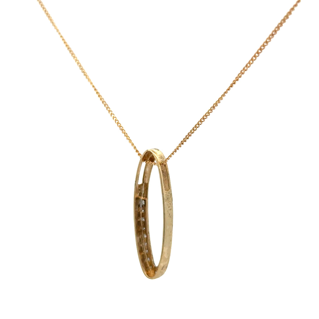 9ct yellow gold chain with diamond pendant, featuring a sleek design and sparkling stones, weighing approximately 3 grams.