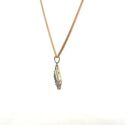 9ct yellow gold chain with emerald and diamond pendant, featuring a detailed design, weighs 5.5g, unbranded jewelry accessory