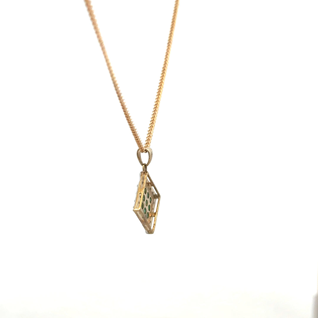 Unbranded 9ct yellow gold chain with emerald and diamond pendant, showing detailed gemstone and gold design.