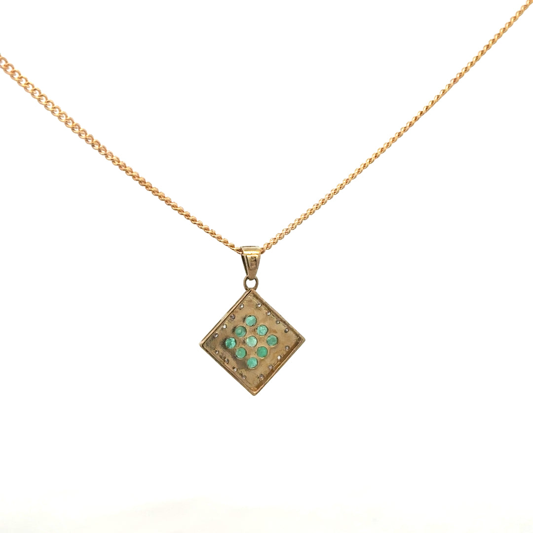 9ct yellow gold chain with emerald and diamond pendant, showcasing a detailed design, weighs 5.5g, unbranded jewelry accessory.