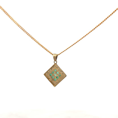 9ct yellow gold chain with emerald and diamond pendant, featuring a detailed design and a total weight of 5.5g.