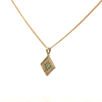 9ct yellow gold chain with emerald and diamond pendant, showcasing a detailed design and elegant gemstone accents.