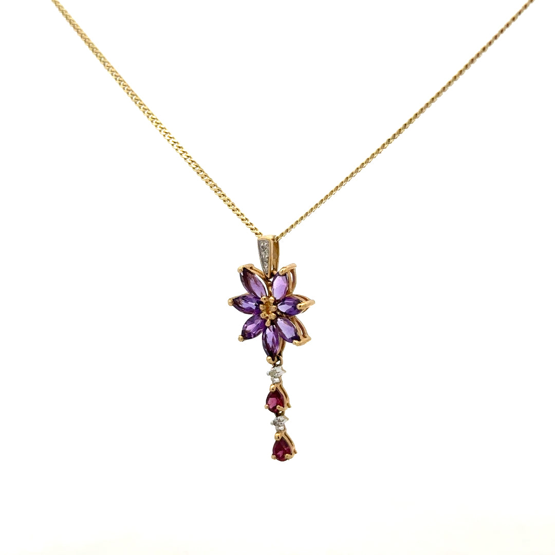 9ct yellow gold chain and pendant, unbranded, with a delicate design, showcasing the gold and pendant details.