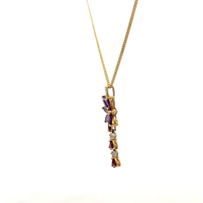 9ct yellow gold chain with pendant, unbranded, 4g, showcasing a detailed gold jewelry design.