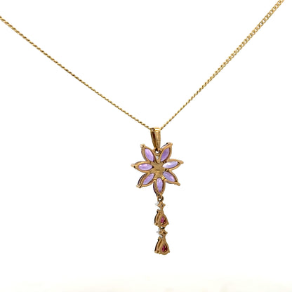 9ct yellow gold chain with pendant, unbranded, weighing 4g, showcasing a classic design on a white background.