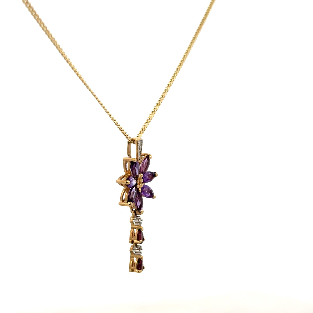 9ct yellow gold chain with a pendant, unbranded, weight 4g, showcasing a delicate jewelry piece on a white background.