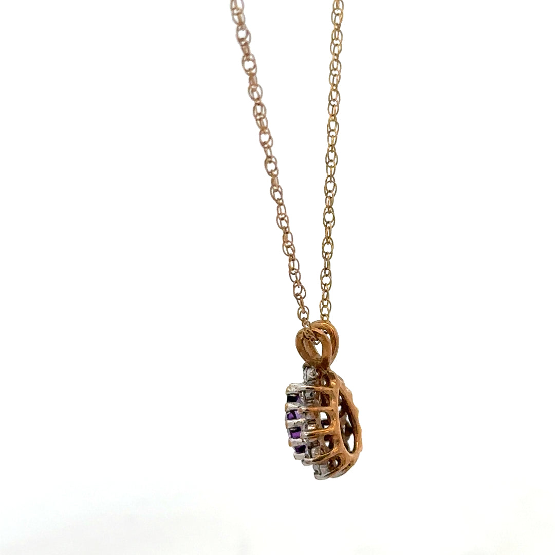 9ct yellow gold chain with pendant, lightweight jewelry piece, unbranded, 1.9g, shown on a plain background.