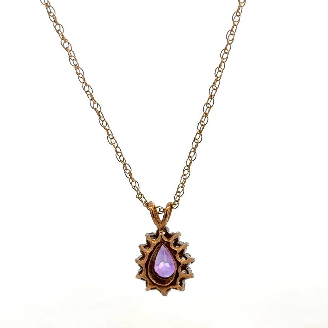 9ct yellow gold chain with pendant, unbranded, showcasing a delicate jewelry piece weighing 1.9g.
