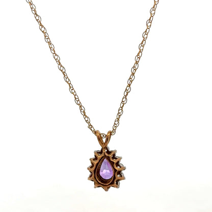 9ct yellow gold chain with pendant, unbranded, showcasing a delicate jewelry piece weighing 1.9g.