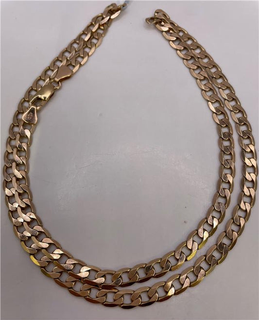 9ct yellow gold chain with a classic link design, showcasing a shiny finish and fine craftsmanship.