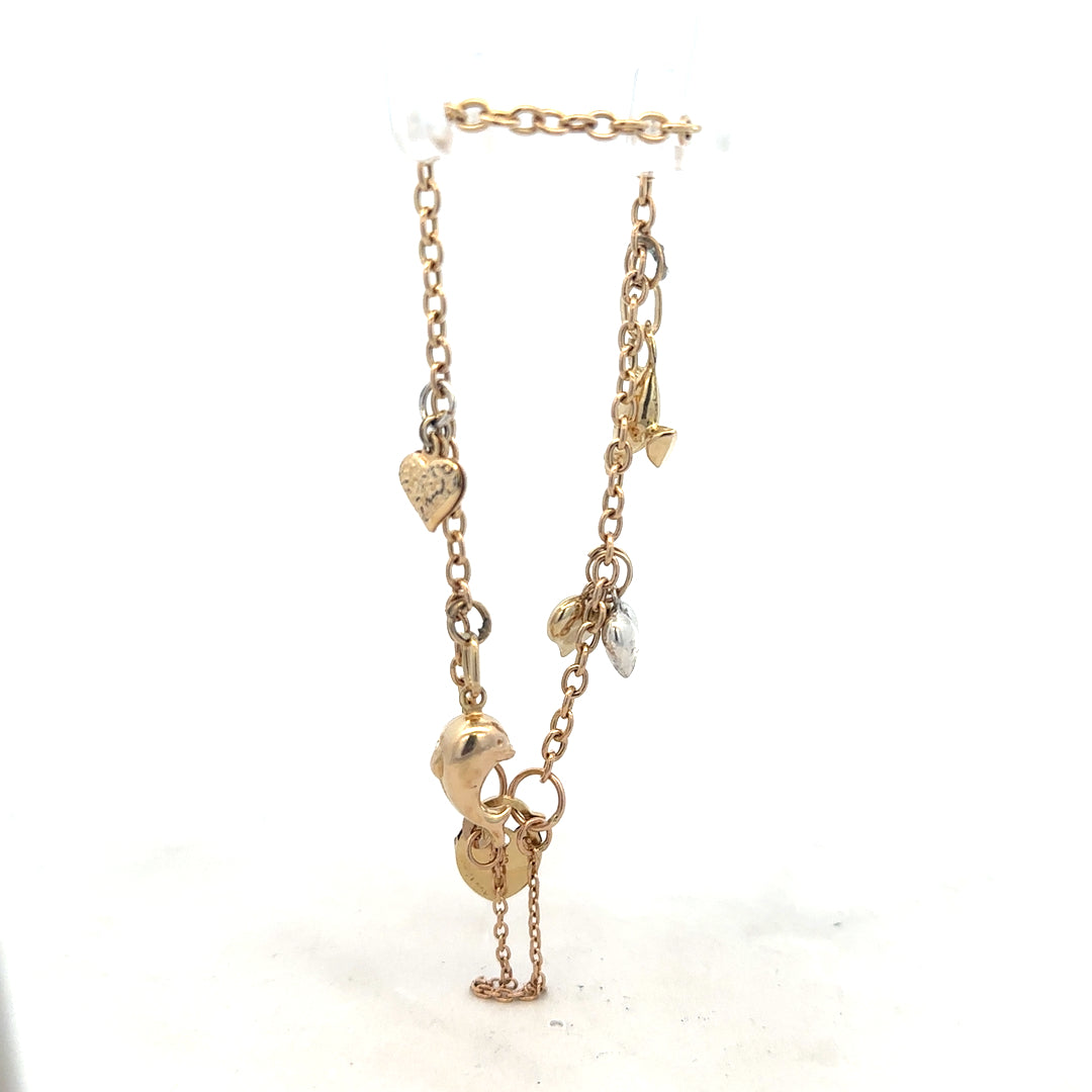 9ct yellow gold charm bracelet weighing 5.4g, unbranded, with detailed charms and a secure clasp visible in the image.