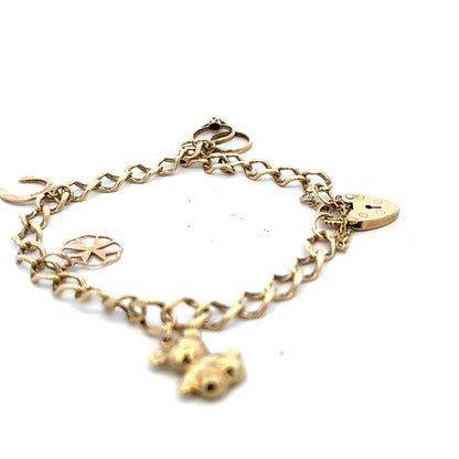9ct yellow gold charm bracelet with intricate details, weighing 9.9g, showcasing a stylish and elegant jewelry piece.