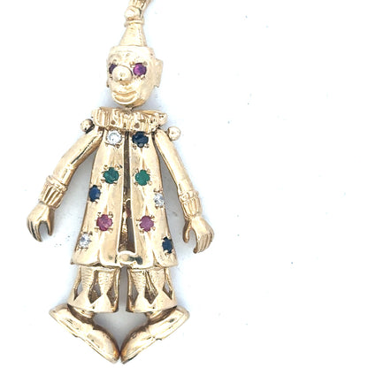 9ct yellow gold clown pendant weighing 20.3g, unbranded jewelry accessory with detailed clown design and polished finish.
