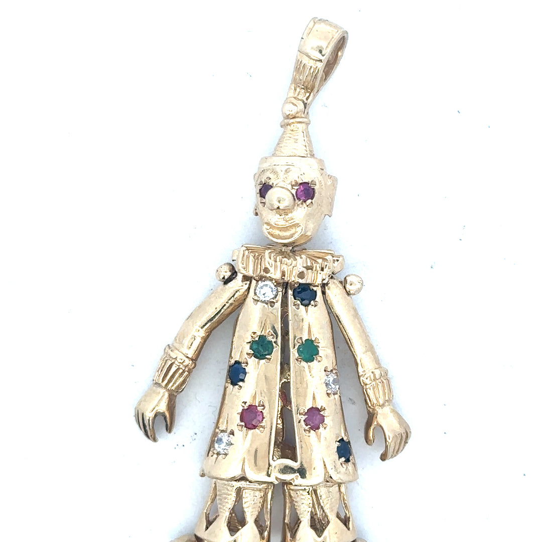 9ct yellow gold clown pendant weighing 20.3g, unbranded jewelry accessory with detailed clown design.