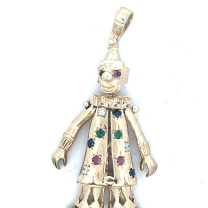 9ct yellow gold clown pendant weighing 20.3g, unbranded jewelry accessory with detailed clown design.