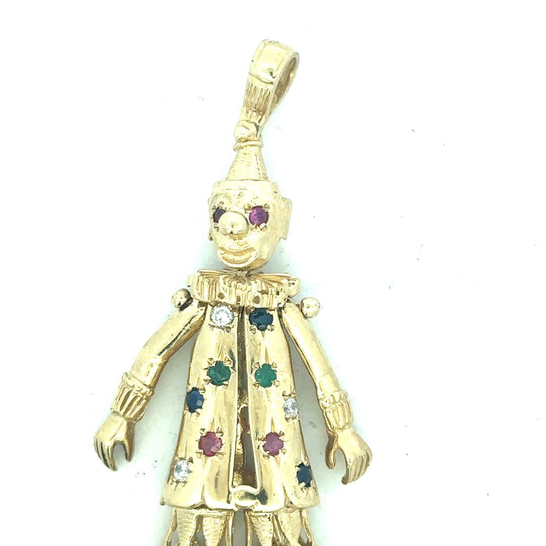9ct yellow gold clown pendant with detailed face and playful design, weighs 20.3 grams, unbranded jewelry accessory.