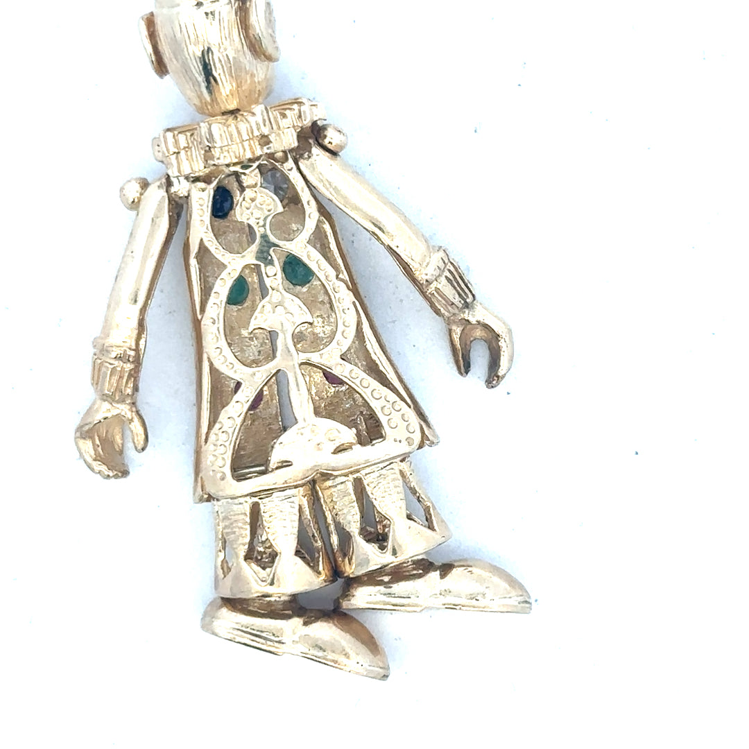 9ct yellow gold clown pendant with detailed facial features and playful design, weighing 20.3 grams.