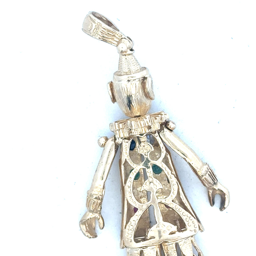 9ct yellow gold clown pendant weighing 20.3g, unbranded jewelry accessory with detailed clown design and polished finish.