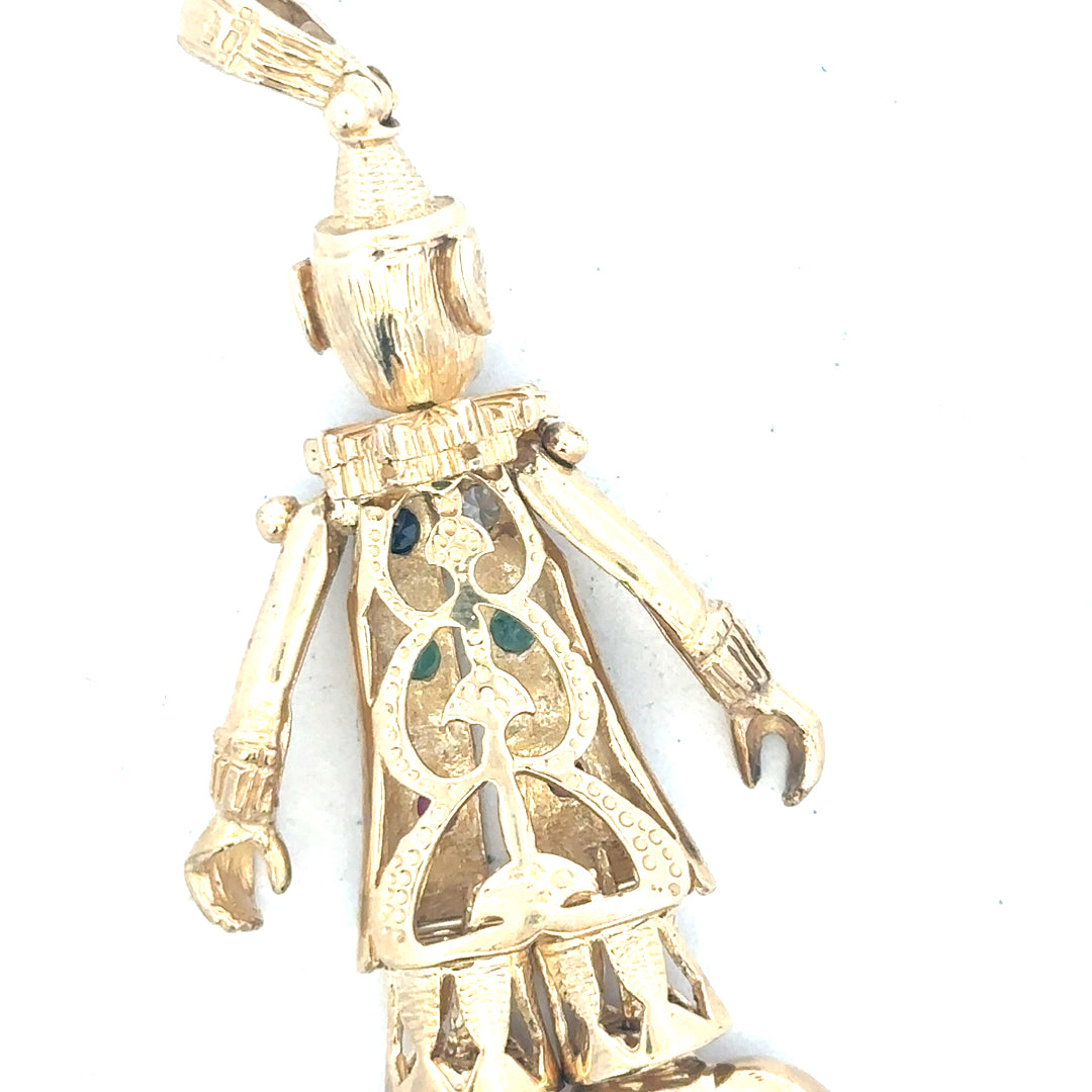 9ct yellow gold clown pendant with detailed face and playful design, weighing 20.3g, unbranded jewelry accessory.