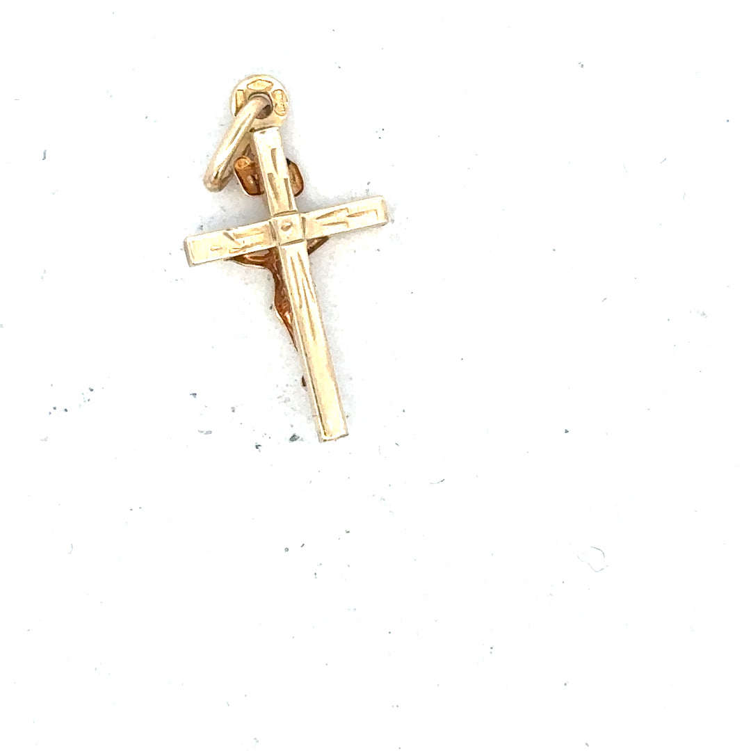 9ct yellow gold cross pendant weighing 1.3g, unbranded jewelry shown in this image.