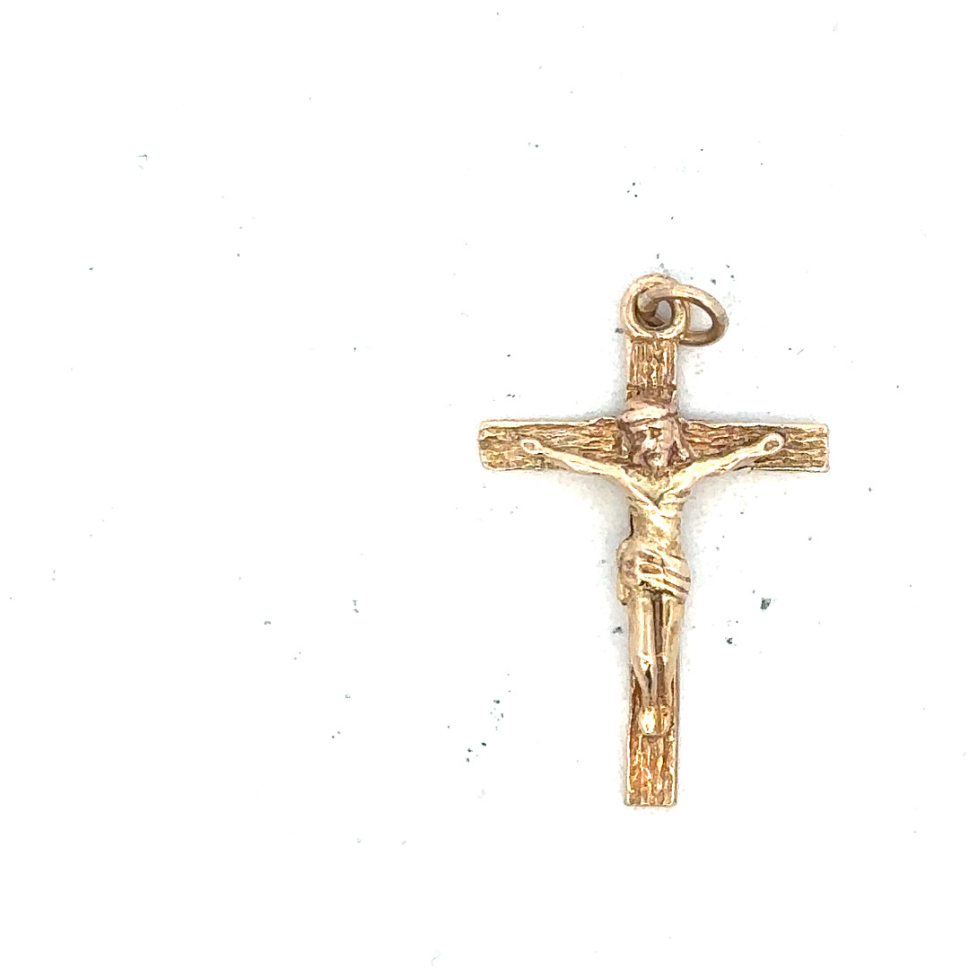 9ct yellow gold cross pendant, unbranded, weighing 1.6g, featuring a simple cross design on a plain background.