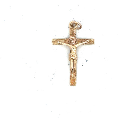 9ct yellow gold cross pendant weighing 1.6g, unbranded jewelry with detailed cross design and polished finish.