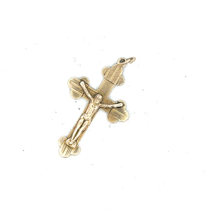 9ct yellow gold cross pendant with a simple design, weighing 2.7g, showcasing a classic religious jewelry piece.