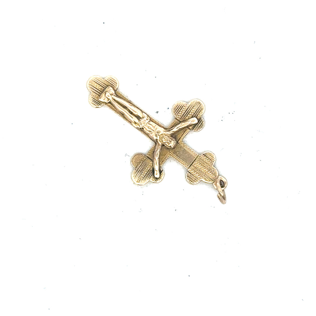 9ct yellow gold cross pendant, unbranded, weighing 2.7g, featuring a classic design with polished finish and detailed craftsmanship.
