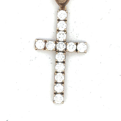 9ct yellow gold cross pendant, unbranded, weight 5.1g, detailed design visible in the image.