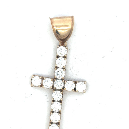 9ct yellow gold cross pendant weighing 5.1g, unbranded, featuring a classic design with polished finish, ideal for necklaces.