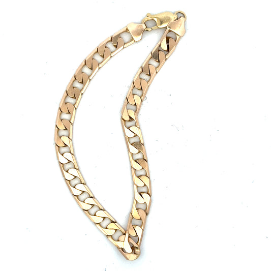 9ct yellow gold curb bracelet with a 14.5g weight, featuring interlocking flat links, unbranded, on a plain background.
